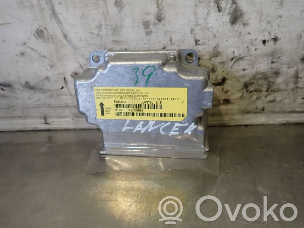 Mitsubishi Lancer X Sterownik / Moduł Airbag 