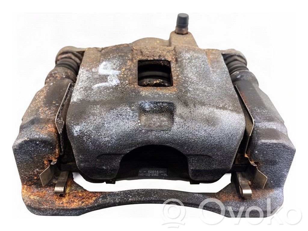 Mazda 2 Caliper de freno delantero 