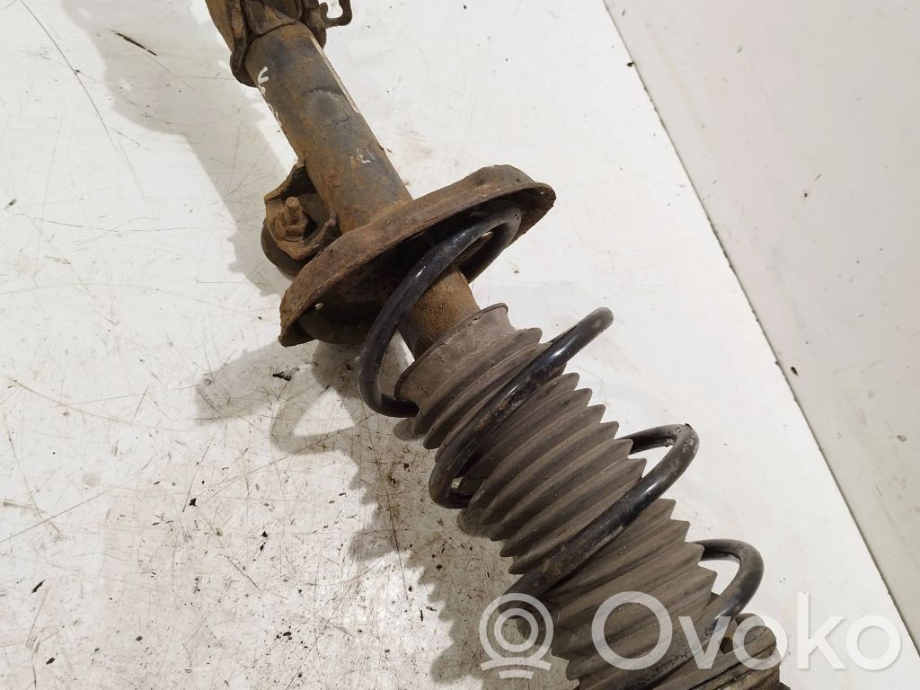 Opel Corsa D Front shock absorber with coil spring 