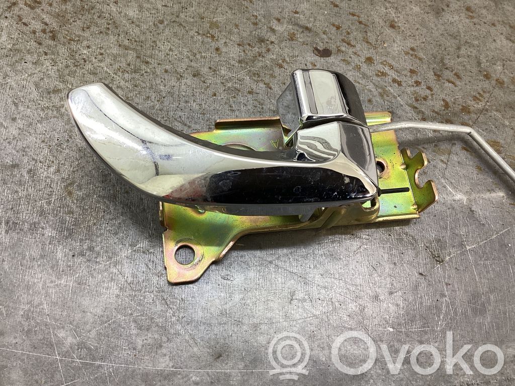 Front door interior handle   E122