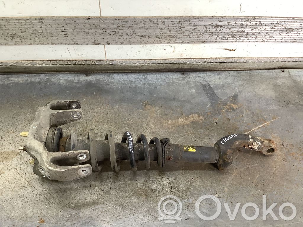 Cadillac SRX Front shock absorber with coil spring 