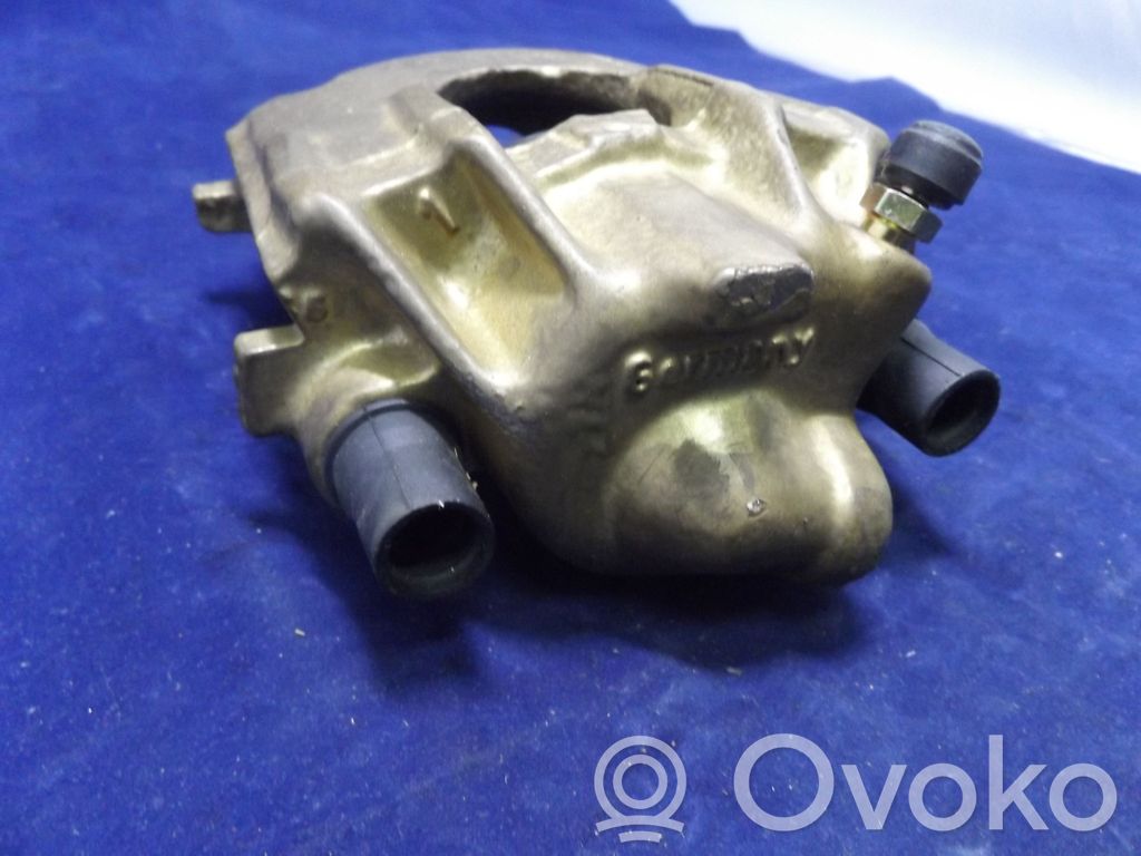 Volkswagen Golf II Front brake caliper 