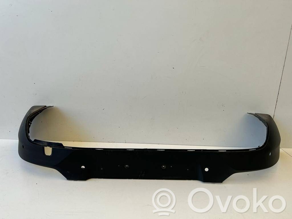 Volvo XC40 Moldura inferior del parachoques trasero 