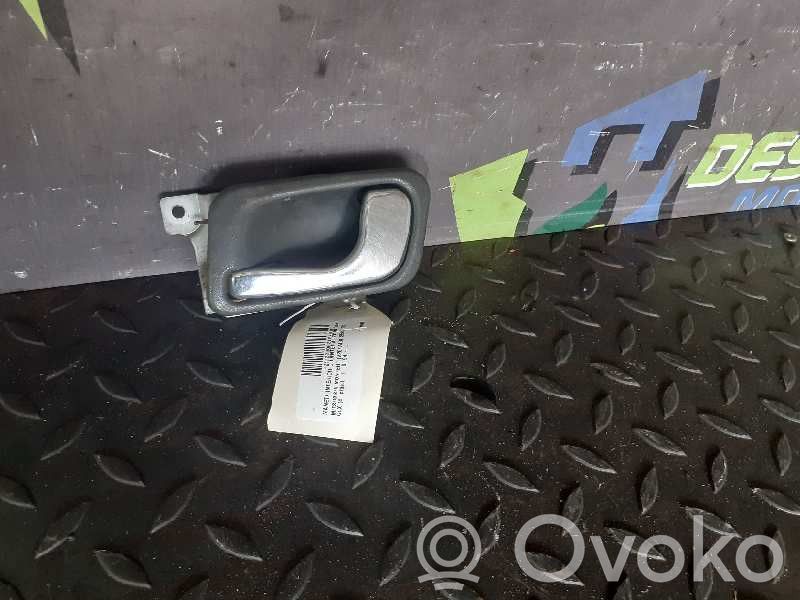 Manecilla interna puerta delantera