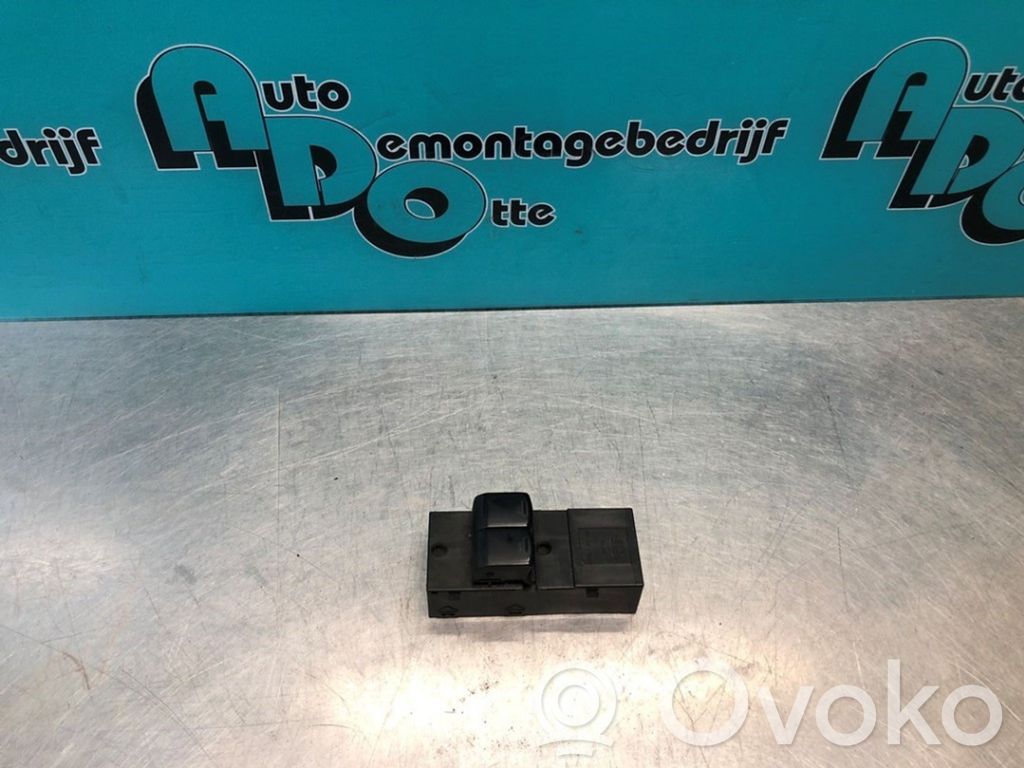 Nissan Micra C+C Electric window control switch 