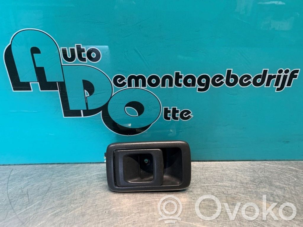 Toyota Starlet (P80) IV Front door exterior handle 