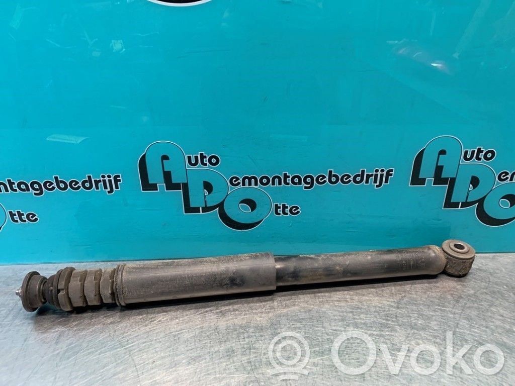 Nissan Note (E11) Amortiguador trasero 