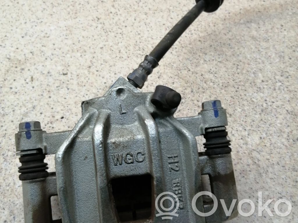 Dacia Spring Front brake caliper 