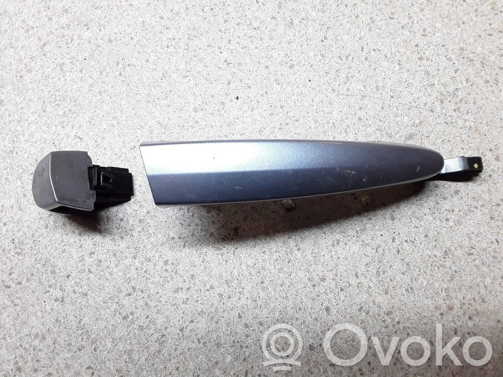 Manecilla externa puerta trasera   E8XR11