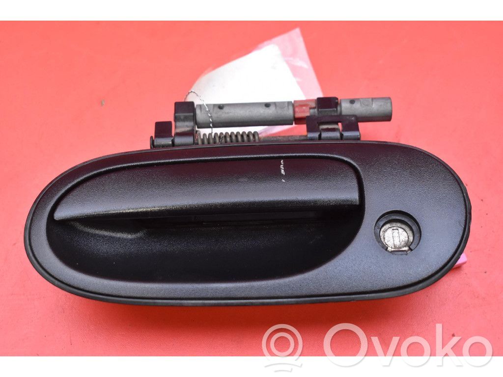 Nissan Almera Tino Manecilla externa puerta delantera