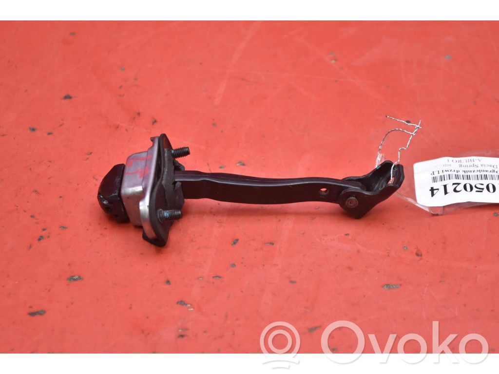 Dacia Spring Opritor ușă față 