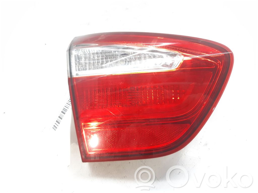 KIA Rio Galinis žibintas dangtyje 