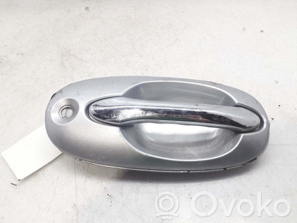 KIA Carnival Manecilla externa puerta delantera 