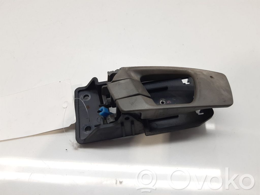 KIA Carens I Manecilla interna puerta delantera