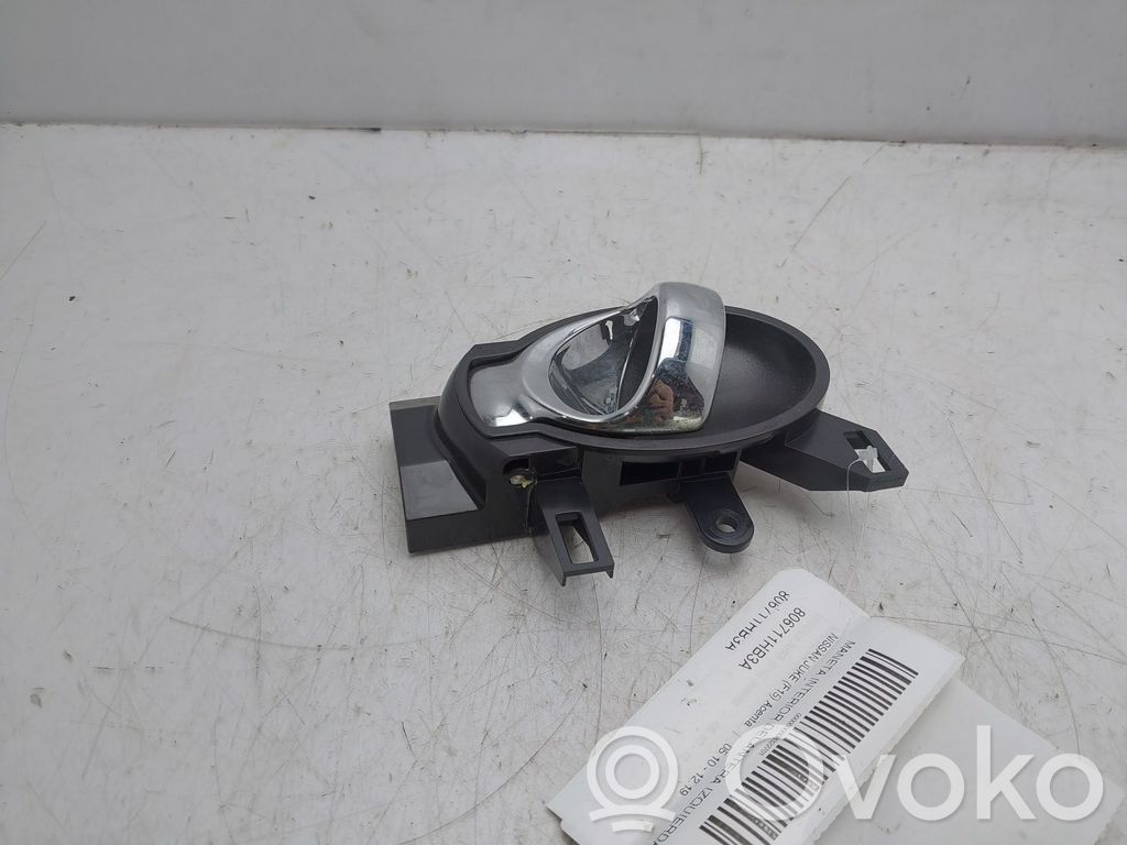Nissan Juke I F15 Manecilla interna puerta delantera 