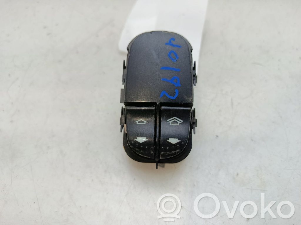 Electric window control switch   YS4T14529AB