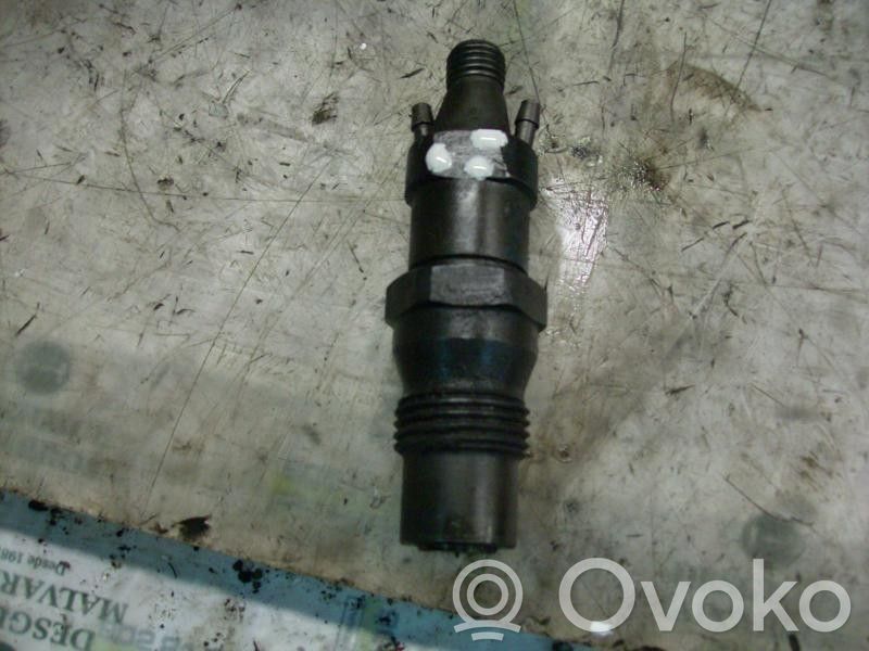 Inyector de combustible