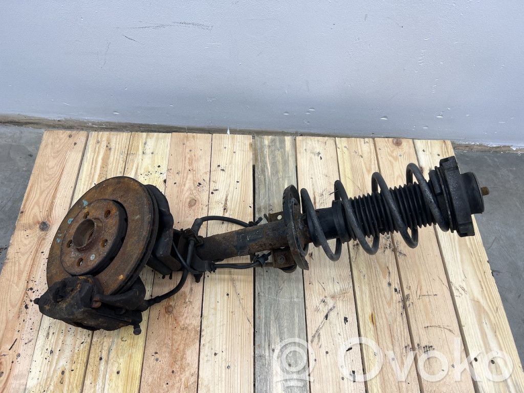 Front shock absorber with coil spring