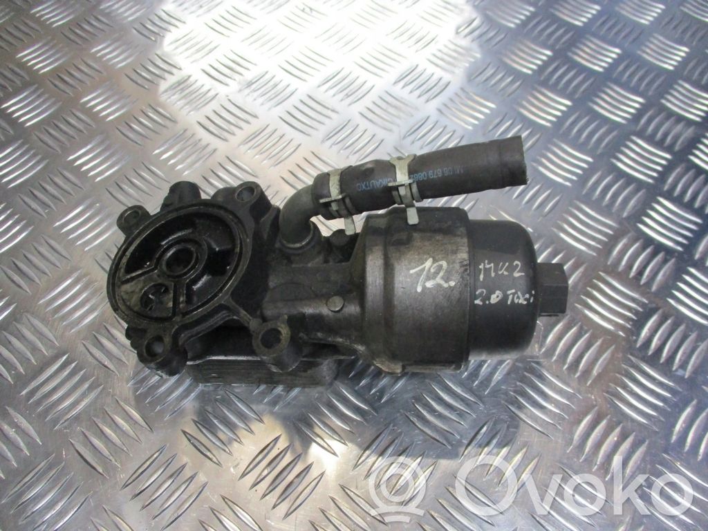Oil filter mounting bracket