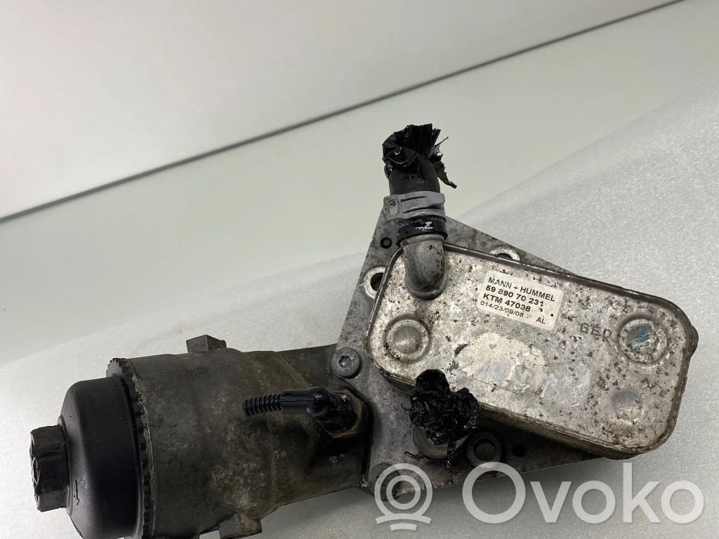 Opel Zafira B Mocowanie / uchwyt filtra oleju 