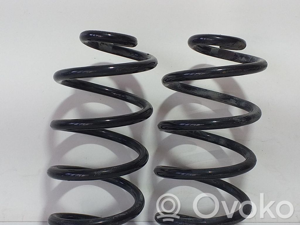 Nissan Juke I F15 Front coil spring 