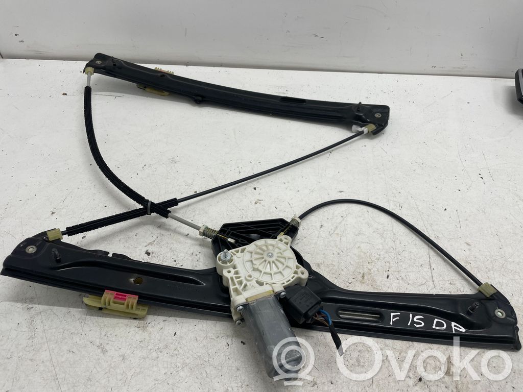 Elektryczny podnośnik szyby drzwi przednich   7283492