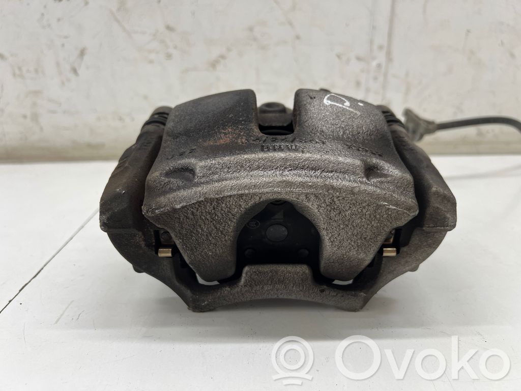 BMW 1 F40 Caliper de freno delantero 