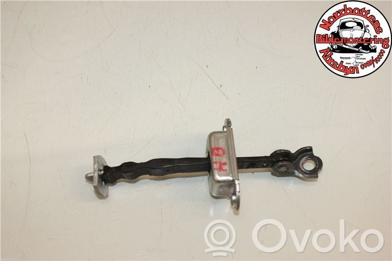 Nissan Note (E11) Rear door check strap stopper 