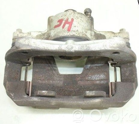 Opel Astra J Zacisk hamulcowy przedni 