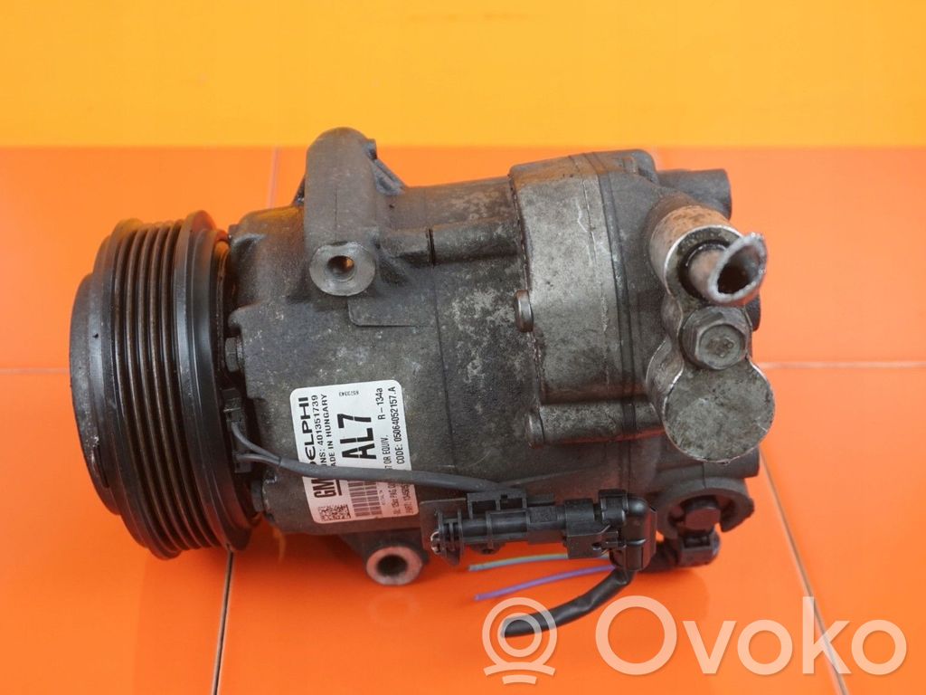 Opel Astra J Air conditioning (A/C) compressor (pump) 