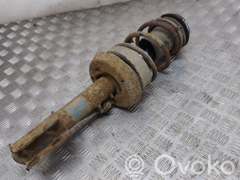 Front shock absorber with coil spring