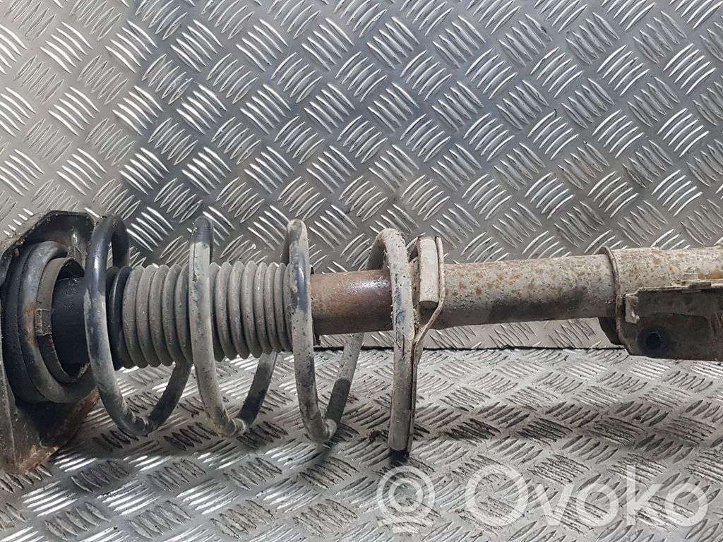 Front shock absorber with coil spring