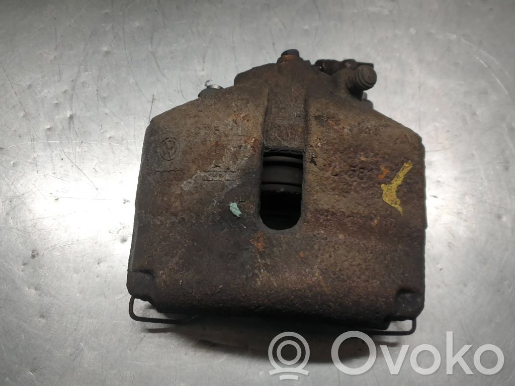 Volkswagen PASSAT B7 Front brake caliper 
