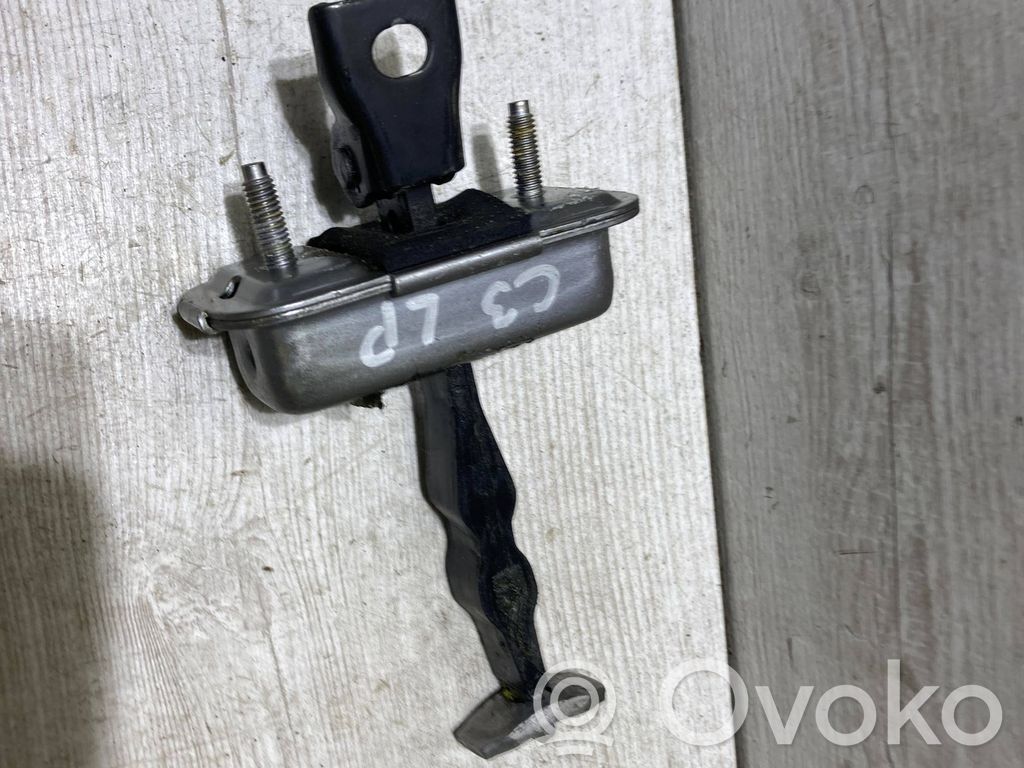 Front door check strap stopper