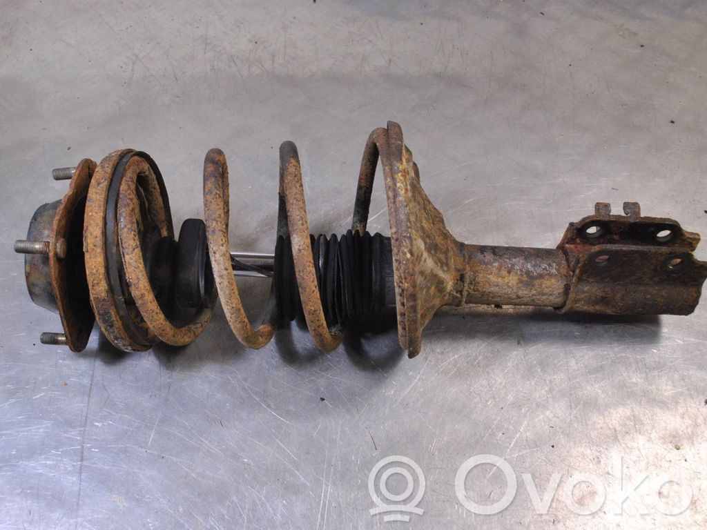 Front shock absorber with coil spring