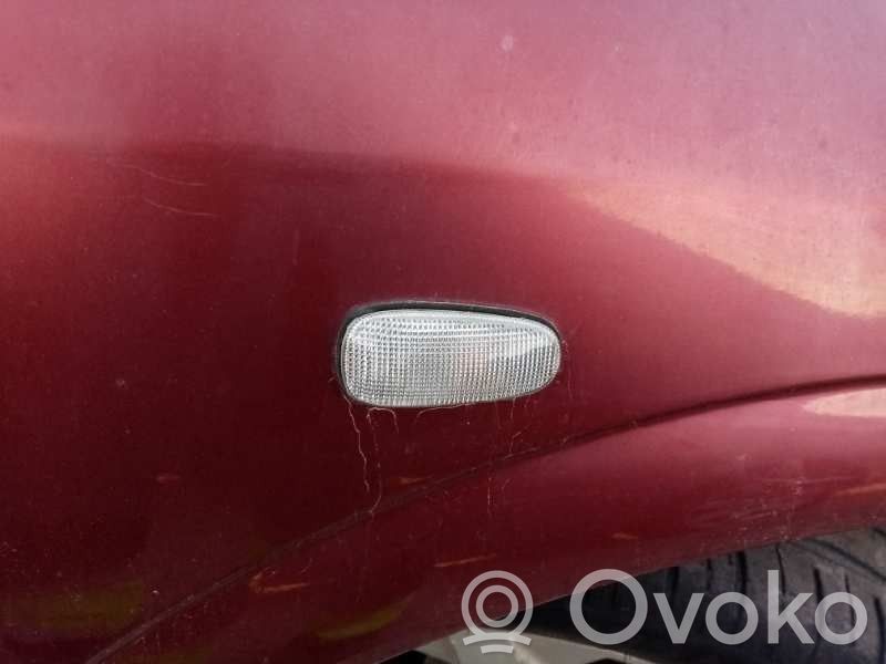Opel Astra G Piloto intermitente del guardabarros delantero 