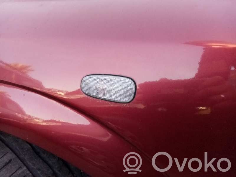 Opel Astra G Piloto intermitente del guardabarros delantero 