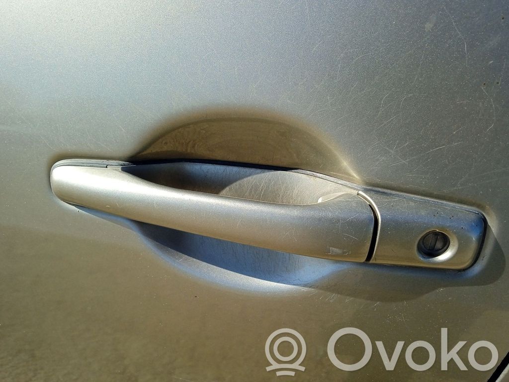 Mitsubishi Grandis Manecilla externa puerta delantera 