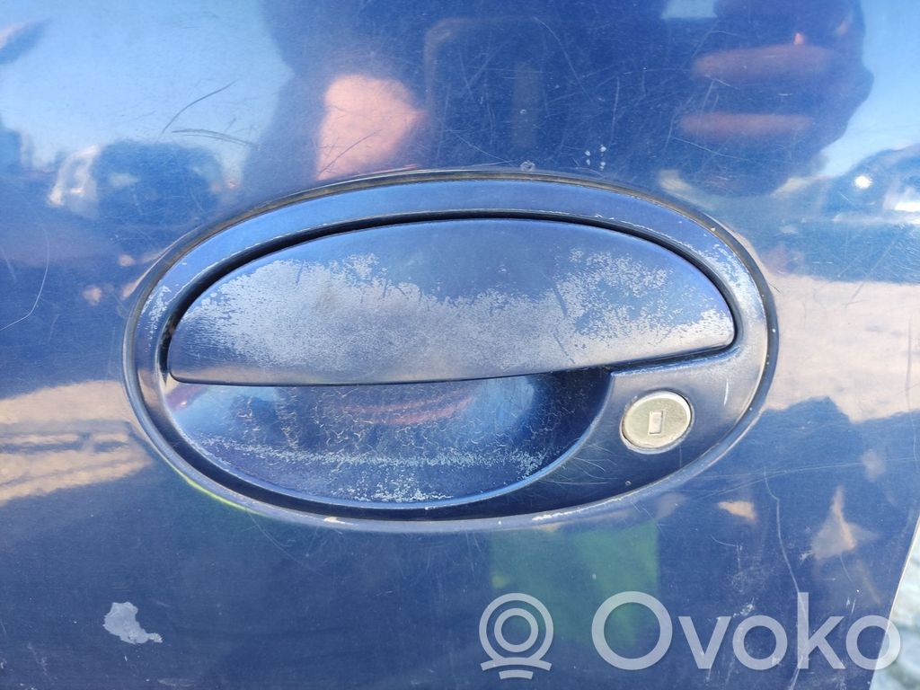 Opel Meriva A Manecilla externa puerta delantera 