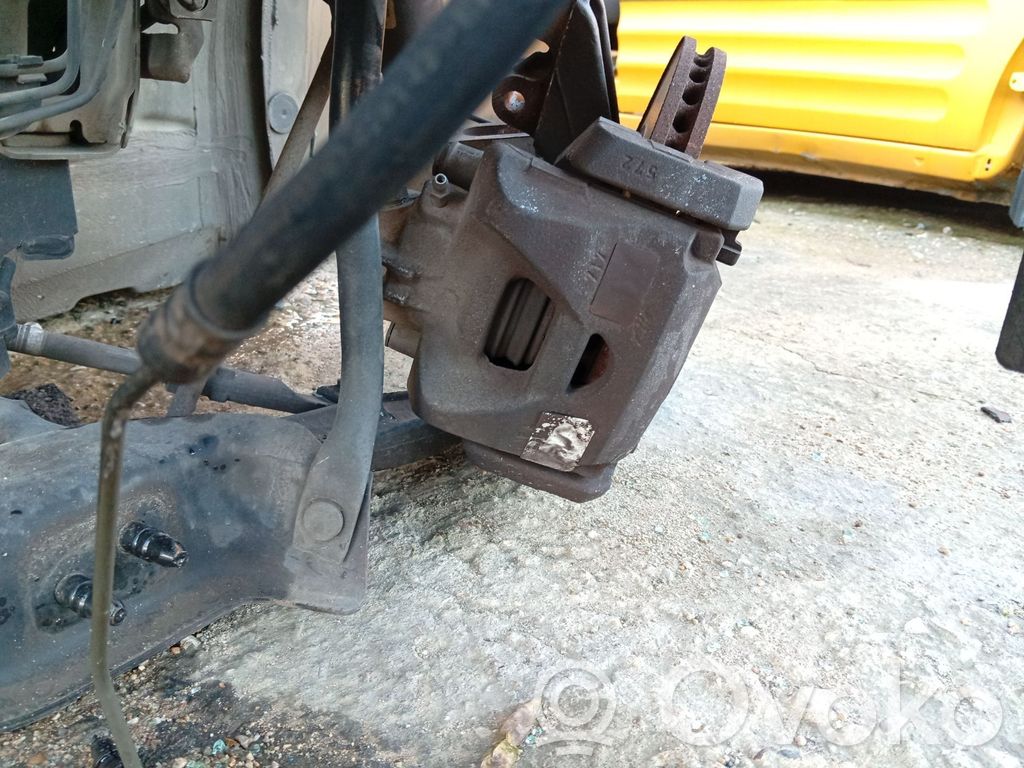 Citroen C4 Grand Picasso Zacisk hamulcowy przedni 