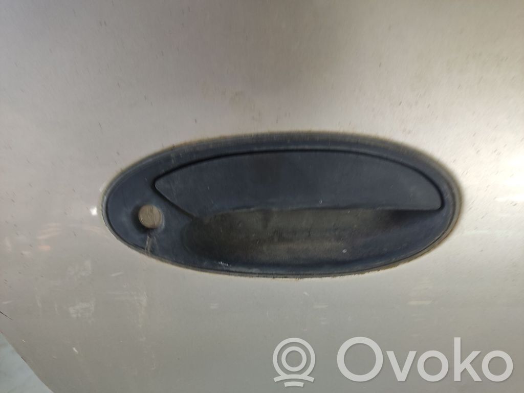 Mitsubishi Colt Manecilla externa puerta delantera 