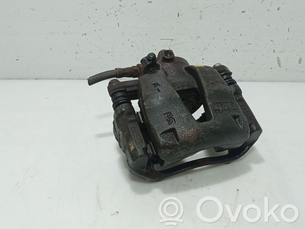 Opel Corsa D Caliper de freno delantero 