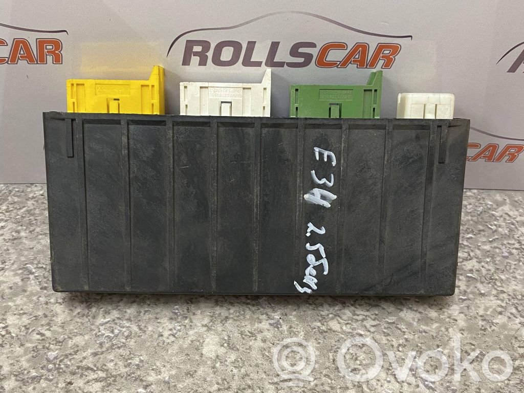 BMW 5 E34 Komforto modulis 