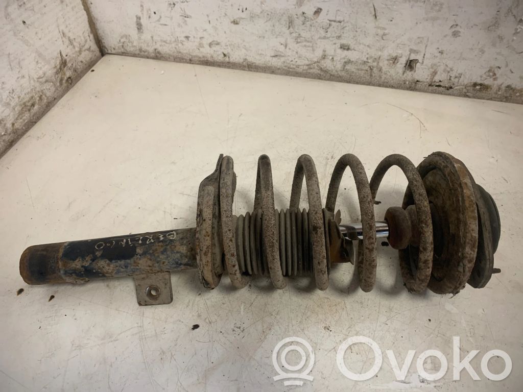 Front shock absorber with coil spring