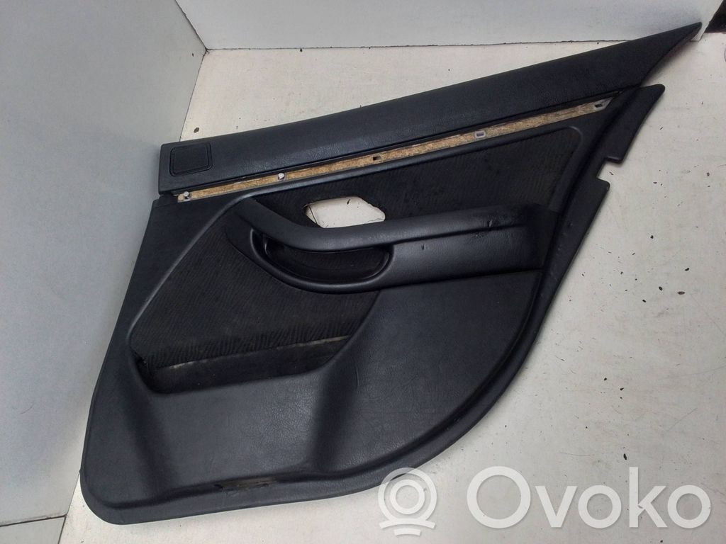 BMW 5 E39 Apmušimas galinių durų (obšifke) 