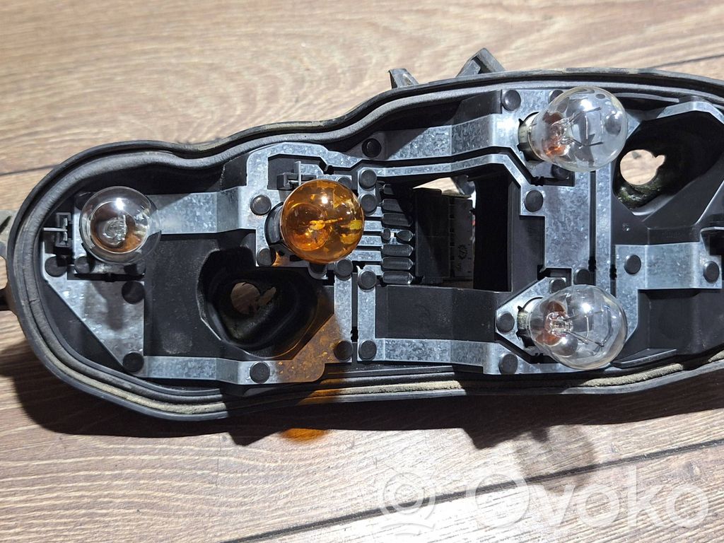 Opel Corsa D Takavalon polttimon suojan pidike 
