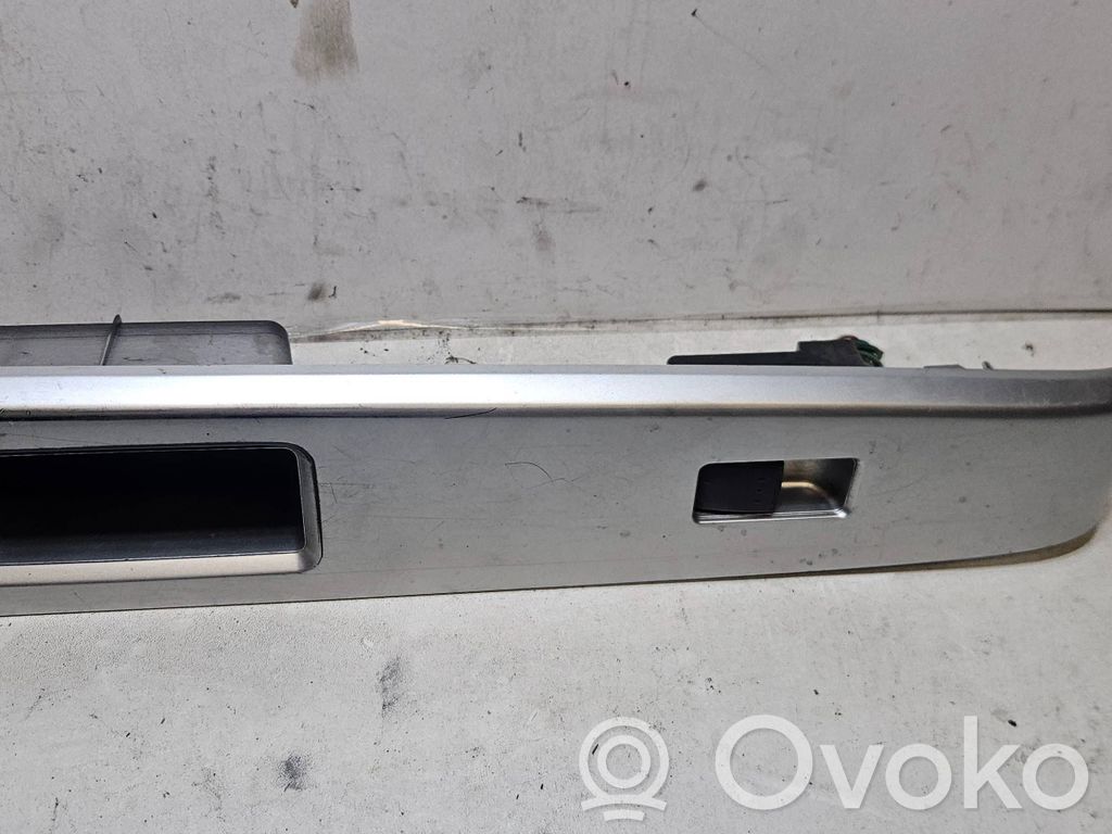 Mazda 5 Front door window switch trim 