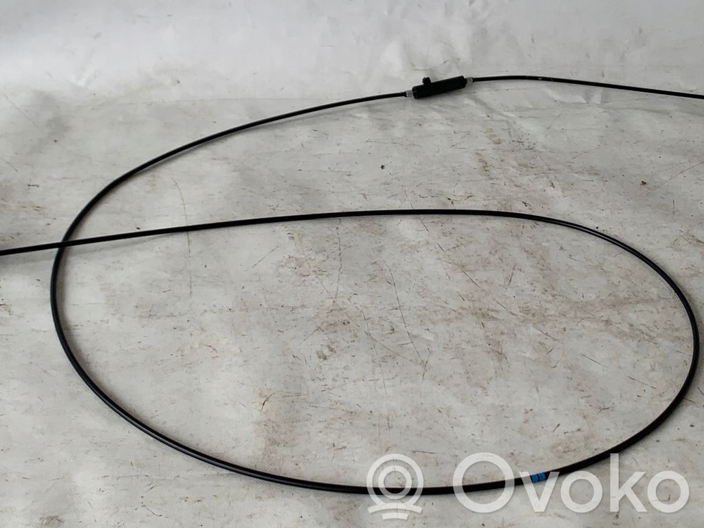 Fuel cap flap release cable