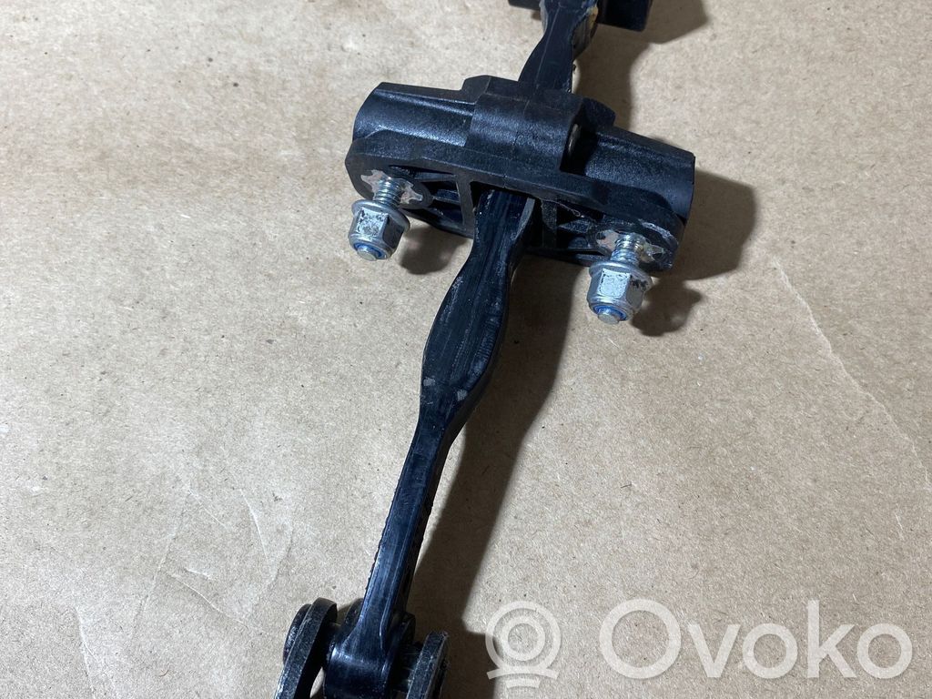 Ford Focus Front door check strap stopper 