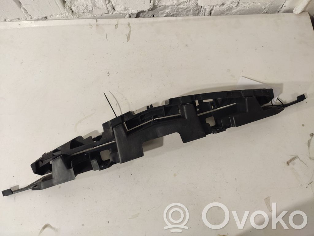 Opel Astra J Uchwyt / Mocowanie zderzaka przedniego 